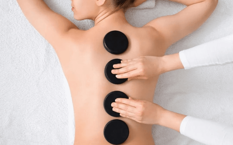 Masaje con Piedras Calientes