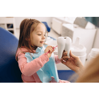 DRA REALES  Odontopediatria - Ortodoncia- Estetica logo