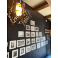 Barbería Garrisons logo