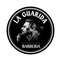 Barbería La guarida logo
