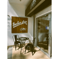 Cindys BarberShop logo