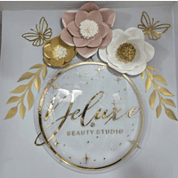 Deluxe Beauty Studio  logo