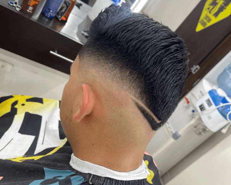 corte de cabello con cuchilla