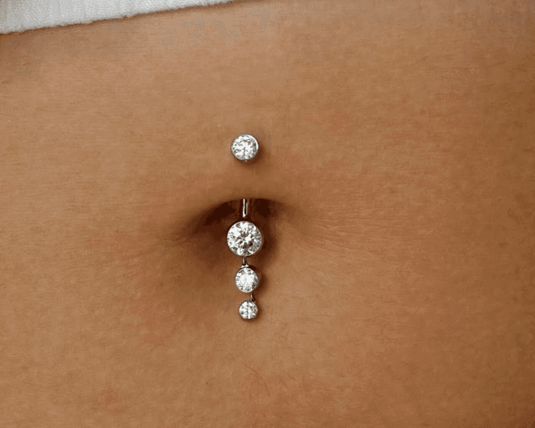 NAVEL (OMBLIGO) INCLUYE JOYA GRADO IMPLANTE