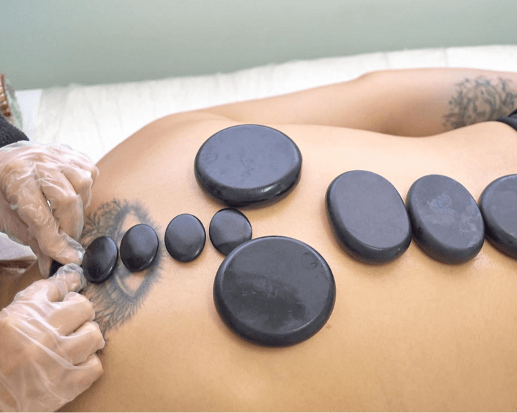 Masaje de cuerpo completo de piedras calientes