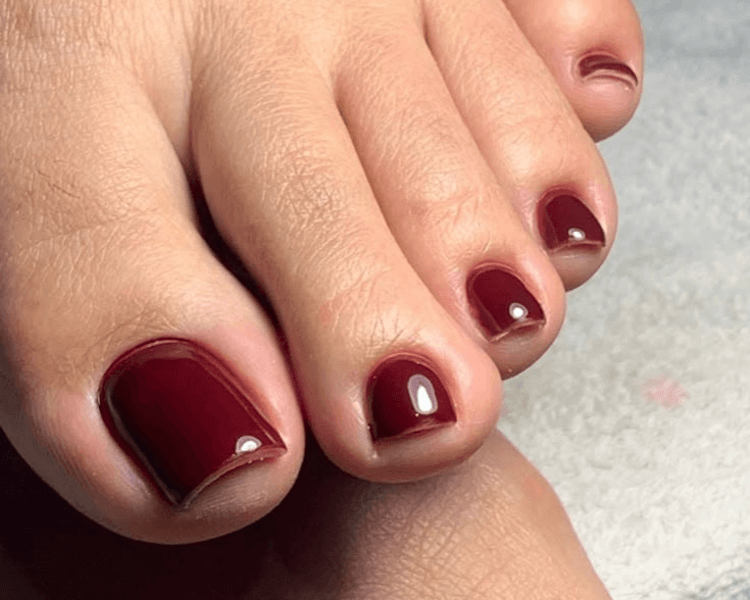 Belleza de pies con semipermanente