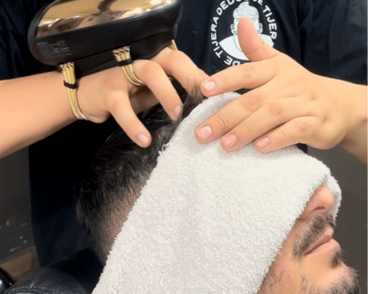 Corte y masaje capilar (incluye lavado)