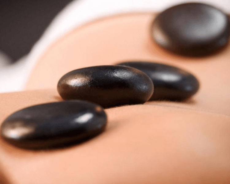 Masaje piedras calientes