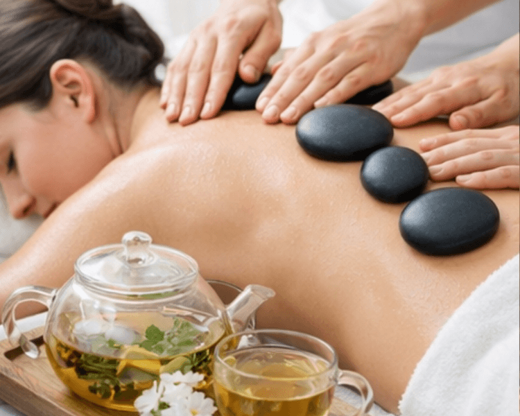 Masaje a cuatro manos +piedras calientes +aromaterapia + infusión 90min