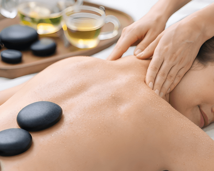 Masaje de tejido profundo · piedras calientes · infusión 60min