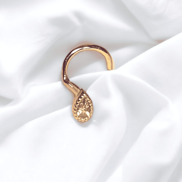 Nostril forma de pera y circonita de oro amarillo 14 KT (Cod 720)