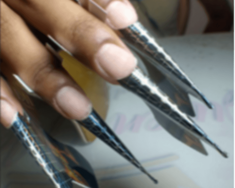 Reconstrucción de uña esculpida (por uña)